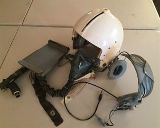 Pilot's helmet, gas mask and headphones.