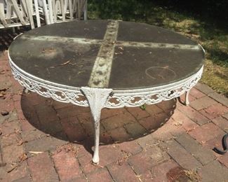 White metal table with glass top.