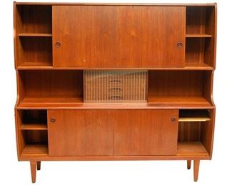 Danish Mid-Century sideboard, having six sliding doors open to shelved interior, with mirror lined accents