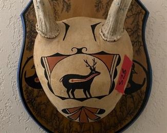 Mounted antlers- Acoma deer/butterfly design, antlers carved to eagle kachina, turquoise