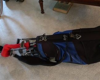 older  golf  clubs  and  bags