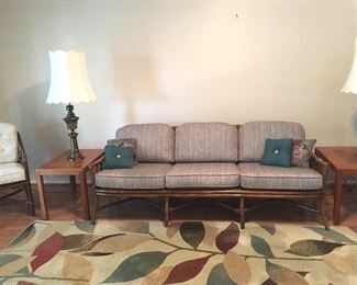 Fisks Reed rattan sofa and Stole teak end tables