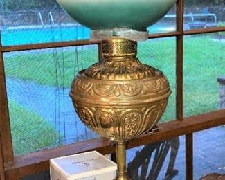 Top of vintage brass and globe floor lamp table