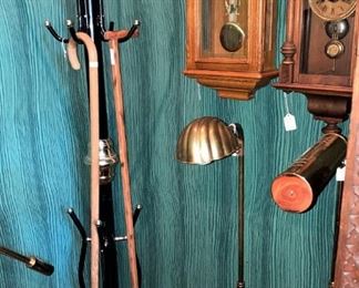 Hat rack, canes, floor lamps, wall clocks