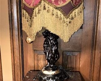 Marble top table and Victorian lamp