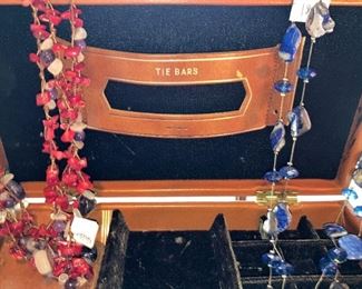 Necklaces; tie bar case