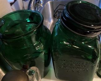 Dark green pitcher and canister