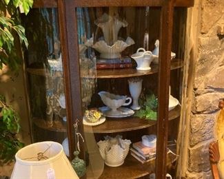 Antique display cabinet with more milk glass