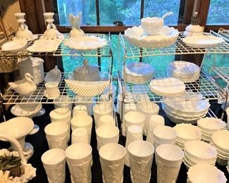 Many pieces of  milk glass