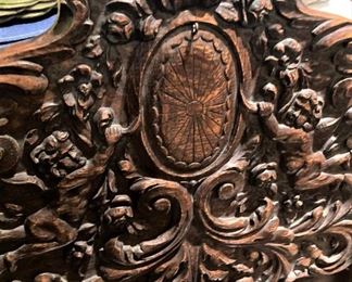 Top carving of cradle