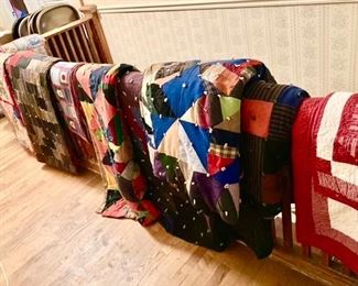 Many vintage hand made quilts