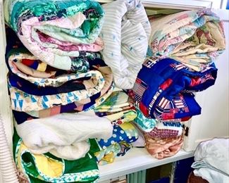 Hand made quilts and miscellaneous bedding