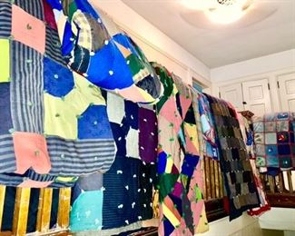 Many vintage and made quilts