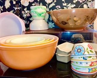 Vintage Pyrex nest of bowls, 1st is in shades of yellow, 2nd is a rooster design in shades of tan/brown