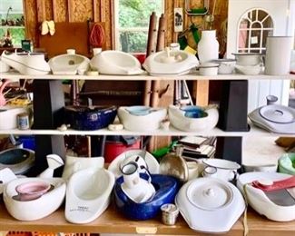 Large collection of vintage bed pans and medical equipment