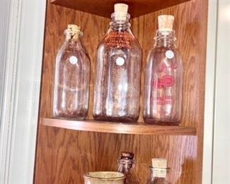 Stoneware face mug, Detroit and others advertising milk bottles, aqua canning jars