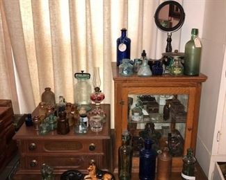 Antique ink bottle collection and needle chest
