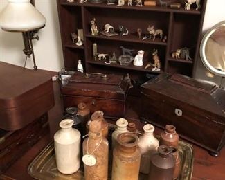Stoneware bottles and antique dogs