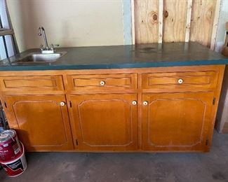 cabinet with sink and countertop