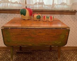 Wood dropleaf table, Hull apple Cookie jar, grease jar, and salt and pepper