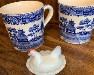 Blue Willow coffee mugs, and miniature hen on nest