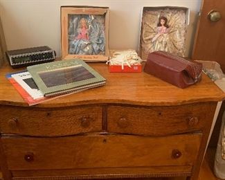 Low boy chest, Two “A little darling doll“ dolls