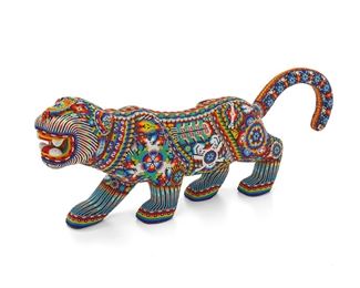 46
Victor Cueva
20th/21st Century, Mexican
Huichol Beaded Jaguar
Beads on wood in acrylic case
9" H x 4.5" W x 26" D
Estimate: $800 - $1,200
