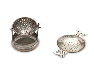 72
Two Mexican Sterling Silver Tea Strainers
Circa 1940-1944 and 1949-1962; Taxco, Mexico
One marked for William Spratling; Further marked: Spratling Silver; One marked for Hector Aguilar; Further marked: Sterling / Taxco / Mexico / Eagle 9
Comprising a William Spratling swivel basket strainer and one Hector Aguilar pour-over strainer with flared handles and ball tips, 2 pieces
Larger: 2.125" H x 2.375" Dia.
3.13 oz. troy approximately
Estimate: $300 - $500
