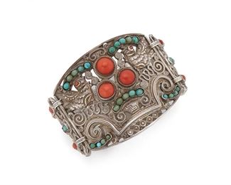 76
A Matl Silver And Gem-Set Dove Bracelet
Circa 1934-1948; Mexico City, Mexico
Stamped: Matl / 0.925/ Hecho en Mexico
Designed by Matilde Poulat, the central panel designed with two doves flanking a coral set basket, and with scrolled links set with coral and turquoise
7" C x 2" H
83.6 grams
Estimate: $800 - $1,200