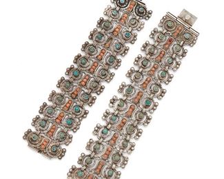 78
Two Matl Silver Link Bracelets
Circa 1934-1948; Mexico City, Mexico
Stamped: Matl; One further stamped: 0.925/ Hecho en Mexico
Designed by Matilde Poulat, comprising a bracelet designed with repeating links set with turquoise and coral (7" x 1.5" W) and a similarly-styled bracelet (6.5" L x 1.5" W), 2 pieces
142 grams gross
Estimate: $800 - $1,200