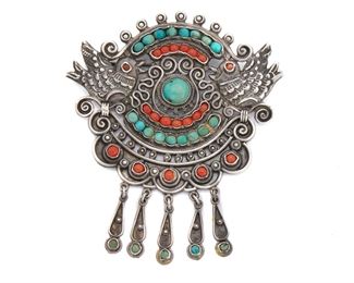 80
A Matl Sterling Silver Pendant/Brooch
Circa 1934-1955; Mexico City, Mexico
Stamped: Matl in script; further marked: Matl/ 0.925/ Hecho en Mexico
Designed by Matilde Poulat, the elaborate dove-motif centerpiece with coral, amethyst, and turquoise fringe
3.25" L x 2.5" W
36.5 grams
Estimate: $1,000 - $1,500