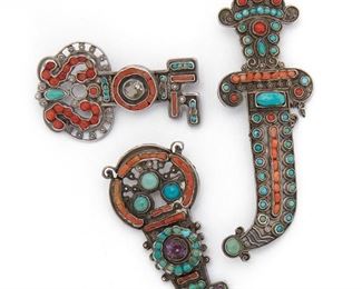 82
Three Matl Gem-Set Brooches
Circa 1934-1955; Mexico City, Mexico
Each stamped: Matl [in script] / Matl / 0.925 / Hecho en Mexico
Comprising a knife-form brooch set with coral and turquoise (4" L x 1.4" W), a pendant/ brooch set with turquoise, coral, and amethyst (2.5" L x 1.25" W), and a brooch set with coral, turquoise, and quartz (2.5" L x 1.5" W), 3 pieces
57.3 grams
Estimate: $800 - $1,200