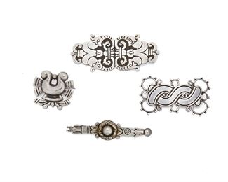 95
Four Mexican Silver Brooches
Four pieces

A William Spratling bar pin
Circa 1933-1940, First Design Period; Taxco, Mexico
Stamped for William Spratling; Further stamped: Taxco
With Aztec motifs
3" L x .7" W

A William Spratling figure-eight-style brooch
Circa 1940-1944, First Design Period; Taxco, Mexico
Stamped for William Spratling; Further stamped: Spratling Silver
1.50" L x 2.50" W

A William Spratling "U" shaped brooch
Circa 1944-1946, First Design Period; Taxco, Mexico
Stamped for William Spratling; Further stamped: Sterling
1.25" L x 1.50" W

A Taxco brooch
20th Century; Taxco, Mexico
Stamped: Taxco / 980
1.55" L x 3.25" W
Estimate: $800 - $1,200