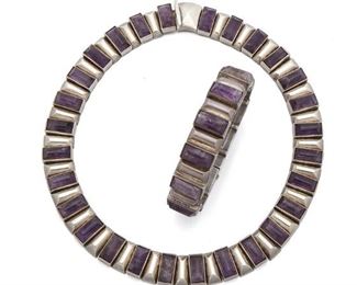 124
A Set Of Antonio Pineda Sterling Silver And Amethyst Jewelry
Circa 1953-1979; Taxco, Mexico
Crown for Antonio Pineda; Each variously stamped: Eagle 208 / JVL Taxco / 970 / Sterling
Comprising a necklace of silver stylized rectangular links alternating with loaf shaped amethysts (15" L x .65" W) en suite with a bracelet (7" L x .65" W), 2 pieces
258 grams
Estimate: $1,500 - $2,500