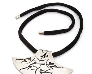 159
An Antonio Pineda Lascaux-Inspired Sterling Silver Necklace
Circa 1953-1979; Taxco, Mexico
Crown mark for Antonio Pineda; Further stamped: Eagle 17 / Hecho en Mexico / 970 / Silver / YY581
The pendant designed with a Lascaux-inspired hunting scene on a black velvet cord with silver endcaps, 2 pieces
Pendant 2.5" L x 5" W
99 grams
Estimate: $800 - $1,200