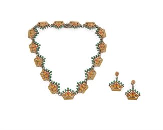 179
A Set Of Margot De Taxco Silver And Enamel Jewelry
Third-quarter 20th Century
Stamped: Margot de Taxco / Made in Mexcio / No. 5623A
Comprising a crown link necklace embellished with green, yellow, and red enamel (15" L x 1.75" H) en suite with a pair of screw-back ear pendants ear clips (1.1" L x 1" W), 3 pieces
76.4 grams gross
Estimate: $400 - $600