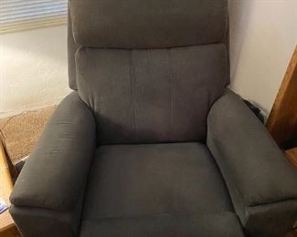Lazyboy recliner.  Like new with mobile phone charge on the side of the recliner.