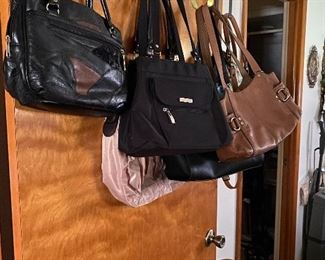 Collection of name brand purses 