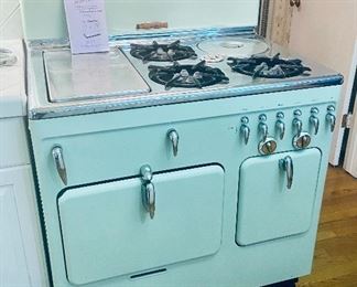 Vintage professionally refinished Chambers stove in excellent clean working condition.