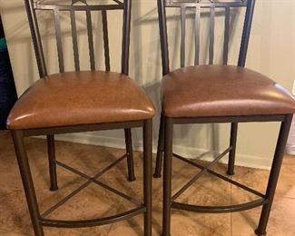 bar height chairs (we have 5) ...the seat is 25” from floor 