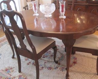 Queen Anne Dining set with extra leaves.