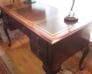 Leather topped desk.