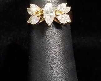 1.34  Carats of Diamonds in 14k Gold featuring a 1/2 Carat Marquise (SI2 G) Center Diamond
