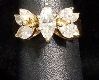 1.34  Carats of Diamonds in 14k Gold featuring a 1/2 Carat Marquise (SI2 G) Center Diamond