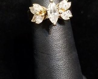 1.34  Carats of Diamonds in 14k Gold featuring a 1/2 Carat Marquise (SI2 G) Center Diamond