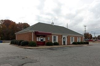 The sale will be held in this former bank building on the corner of Cox Rd and Ozark