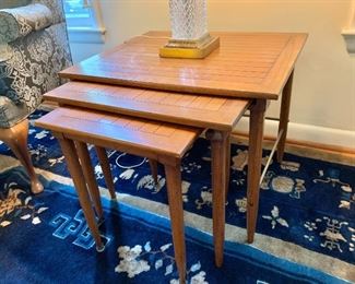 $250  Sophisticate  by Tomlinson set 3 teak nesting tables.  AS IS - minor damage on top surface.  Largest: 20"H, 24" W,  20 D; smallest: 18.5"H, 16.5" W,  15" D.