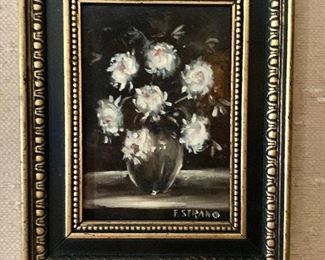 $95 "E. Strano" signed black floral painting on board (lacquered).  10"H x 8" W 