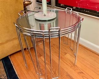 $400 Set of 6 circular glass and chrome stacking tables, 19" H x 16" diam.