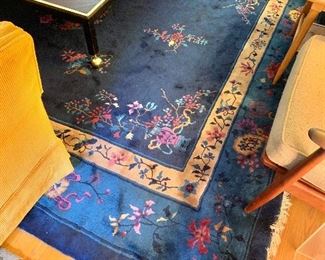 $1250 Chinoiserie blue, white, and pink rug with floral motifs.  120" L x 99" W. 